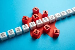 White and red keyboard keys are arranged on a blue background. The white keys, each printed with a paper icon, surround and enclose red keys that are arranged in a cluster on a red, star-shaped base. The red keys feature small, shadowy figures.