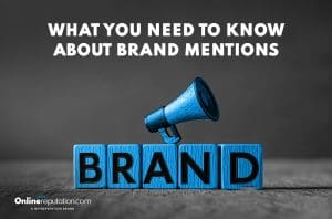 Image of a blue megaphone resting on blue blocks spelling "BRAND" with the text above reading "What You Need to Know About Brand Mentions." Highlighting the impact of brand mentions, OnlineReputation.com logo is in the bottom left corner.